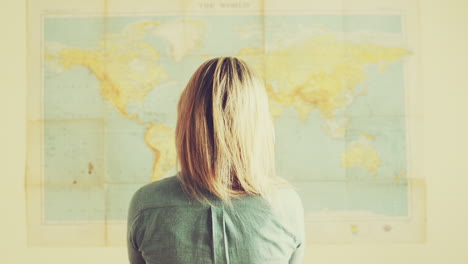 Young-tourist-travel-woman-look-at-world-map-background